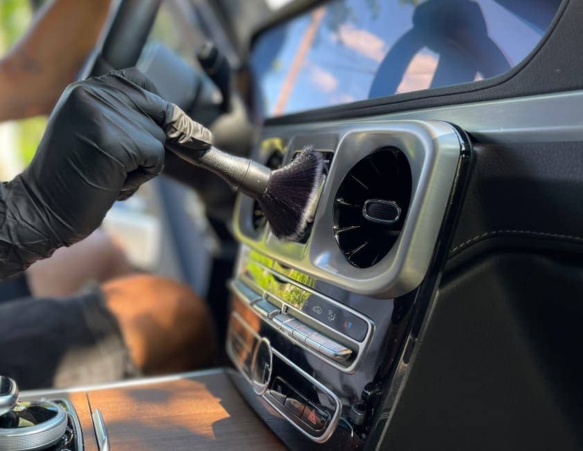 cleaning ac vents with brush